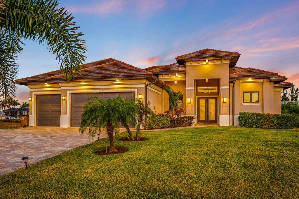 Exterior Twilight of a residential property in Cape Coral, FL